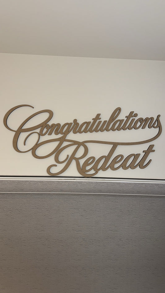 Custom unfinished multi-line laser-cut name sign